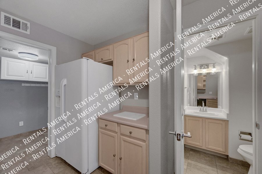 WELCOME HOME TO THIS COZY HENDERSON TOWNHOME! property image