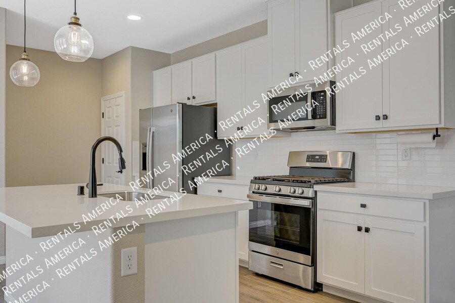 *COMING SOON* BEAUTIFUL *GATED* Designer Townhome in NLV! property image