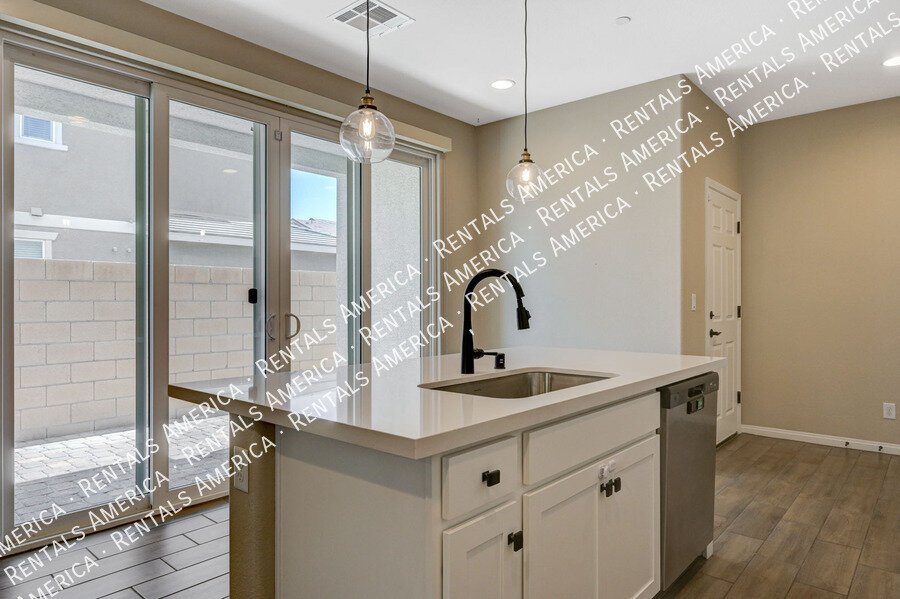 *COMING SOON* BEAUTIFUL *GATED* Designer Townhome in NLV! property image